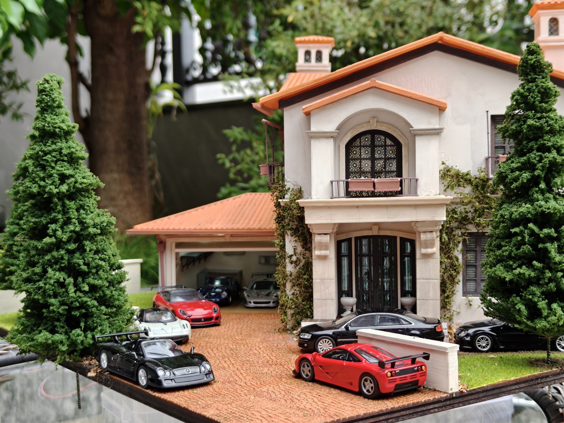 Front view with open garage